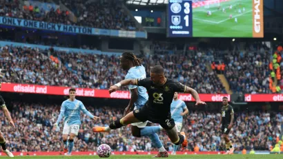 Žeremi Doku (Mančester Siti) i Kajl Voker (Barnli)